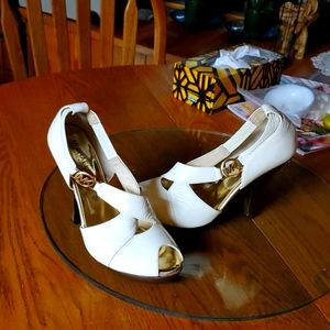 Michael Kors creamy white peep toe heels